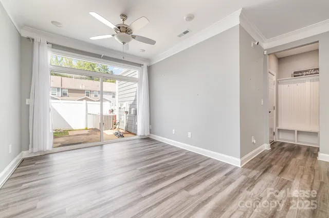 a kitchen with granite countertop a sink and cabinets