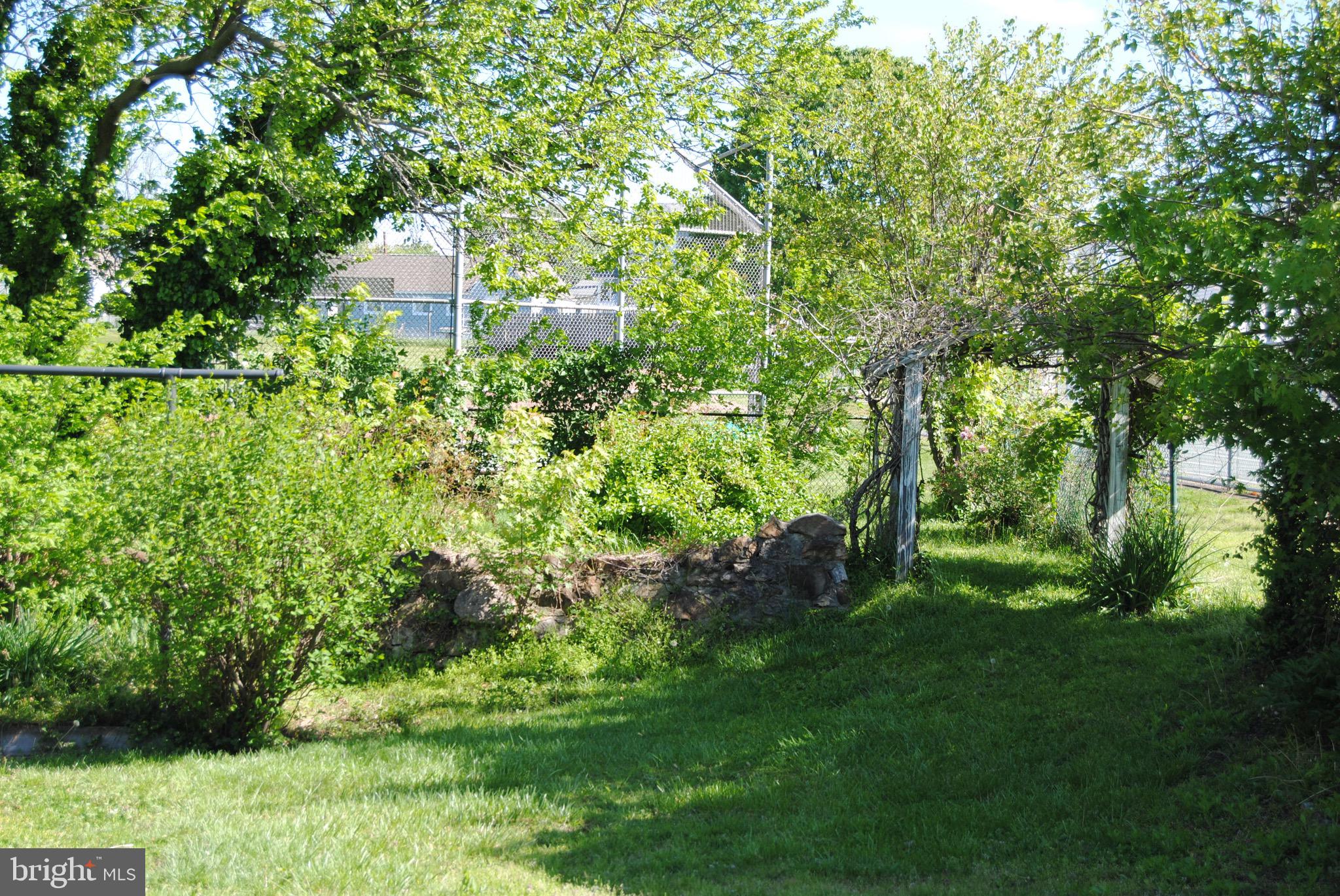 1252 Sulphur Spring Road Baltimore, MD 21227 - Photo 40 of 51 stone retaining wall...sweet archway...