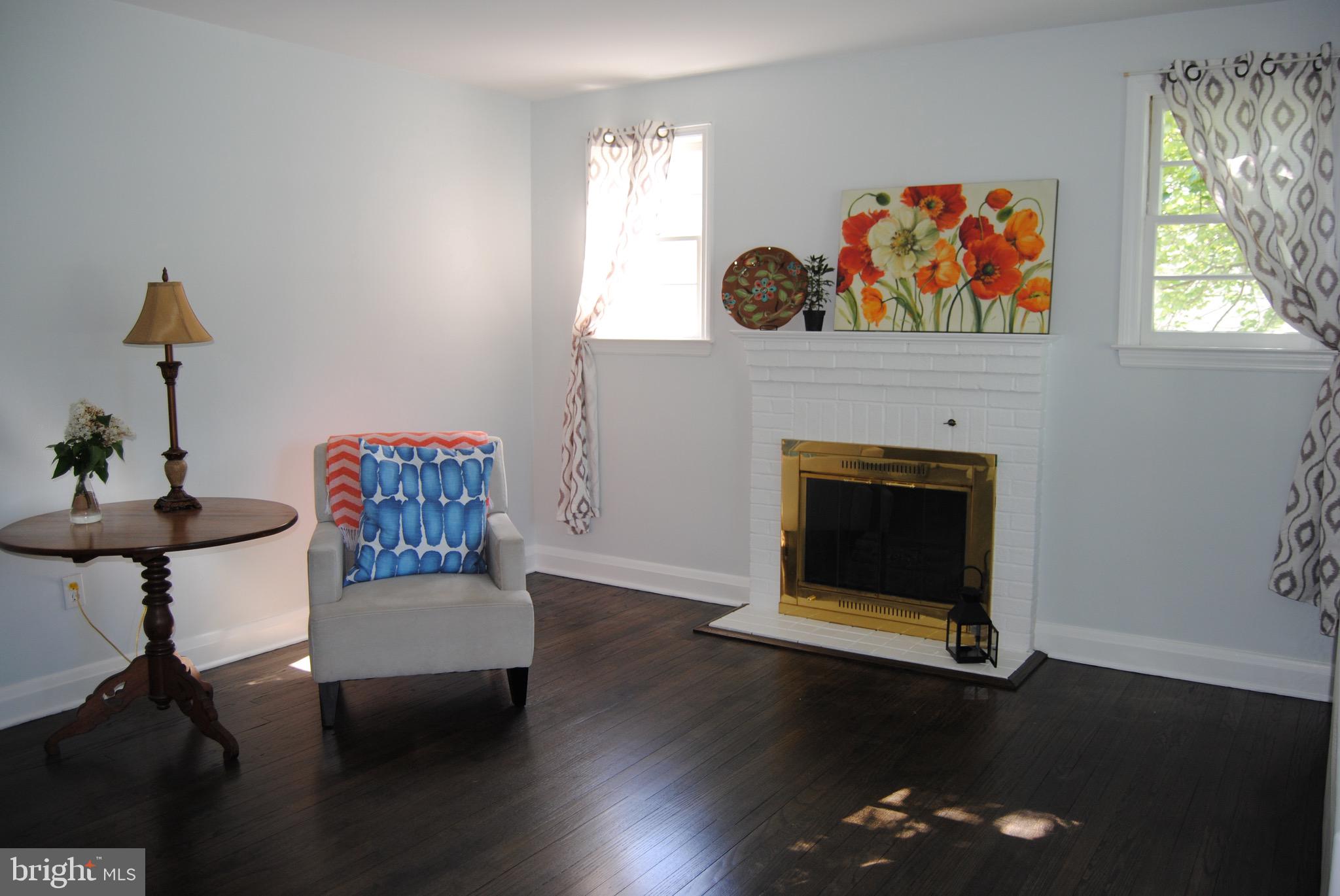 1252 Sulphur Spring Road Baltimore, MD 21227 - Photo 7 of 51 Sweet living room with Ebony hardwoods!