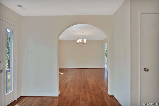 5700 North Chase Road Midlothian, VA 23112 - Photo 5 of 30 a view of a room with wooden floor