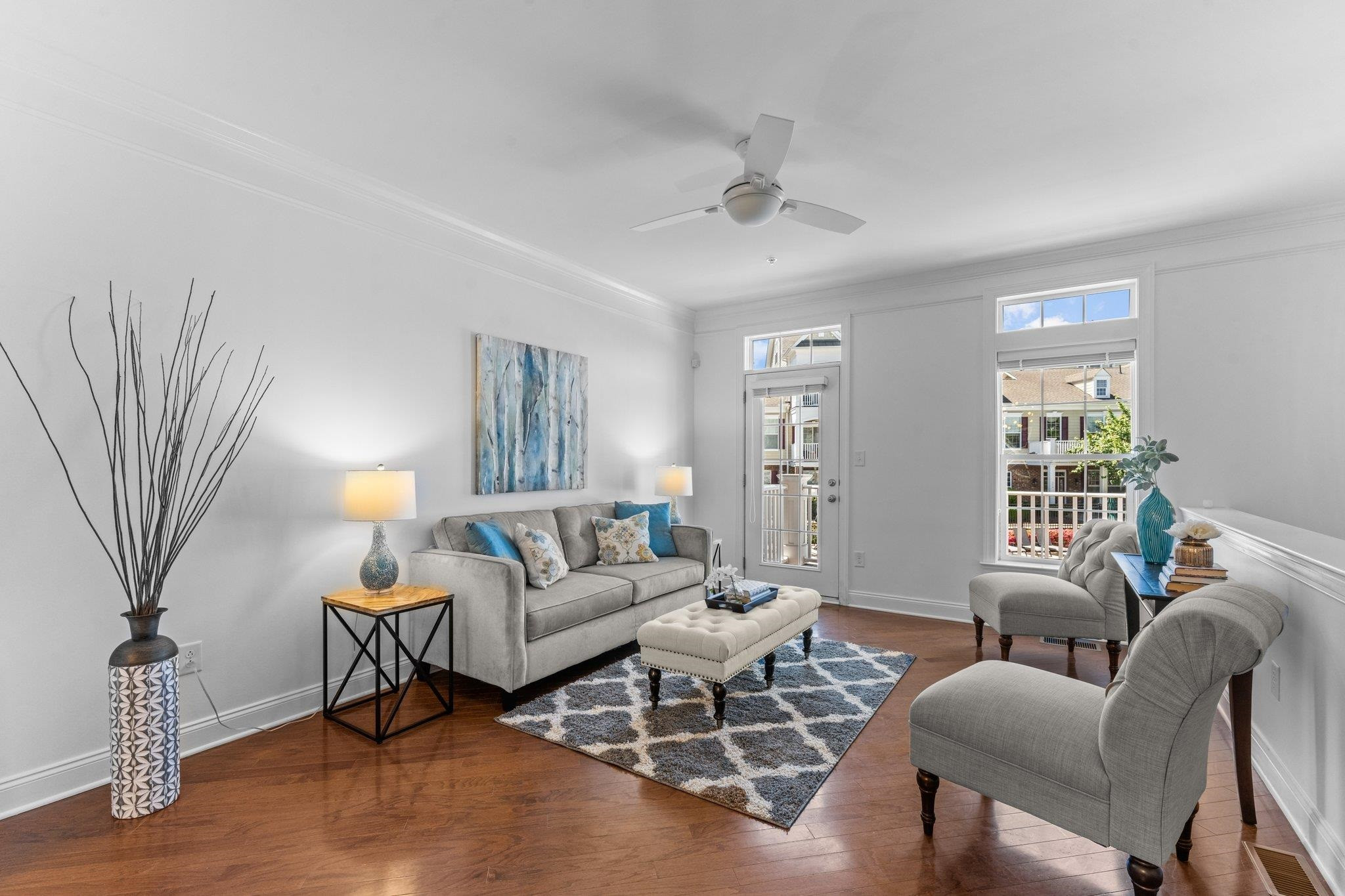 10321 Sablewood Drive, Unit 109 Raleigh, NC 27617 - Photo 1 of 47 a living room with furniture and a large window