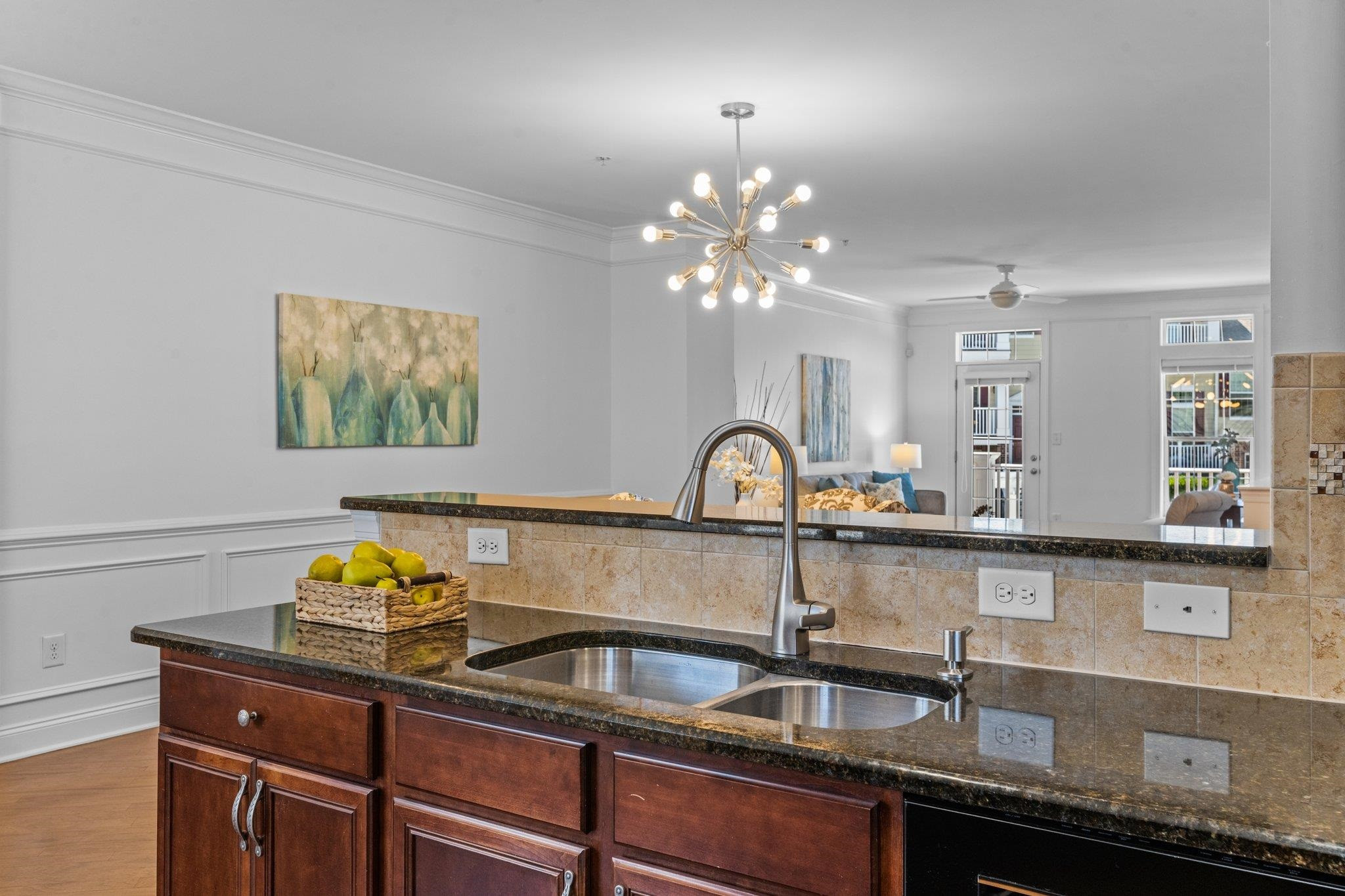 10321 Sablewood Drive, Unit 109 Raleigh, NC 27617 - Photo 12 of 47 a kitchen with a sink and cabinets