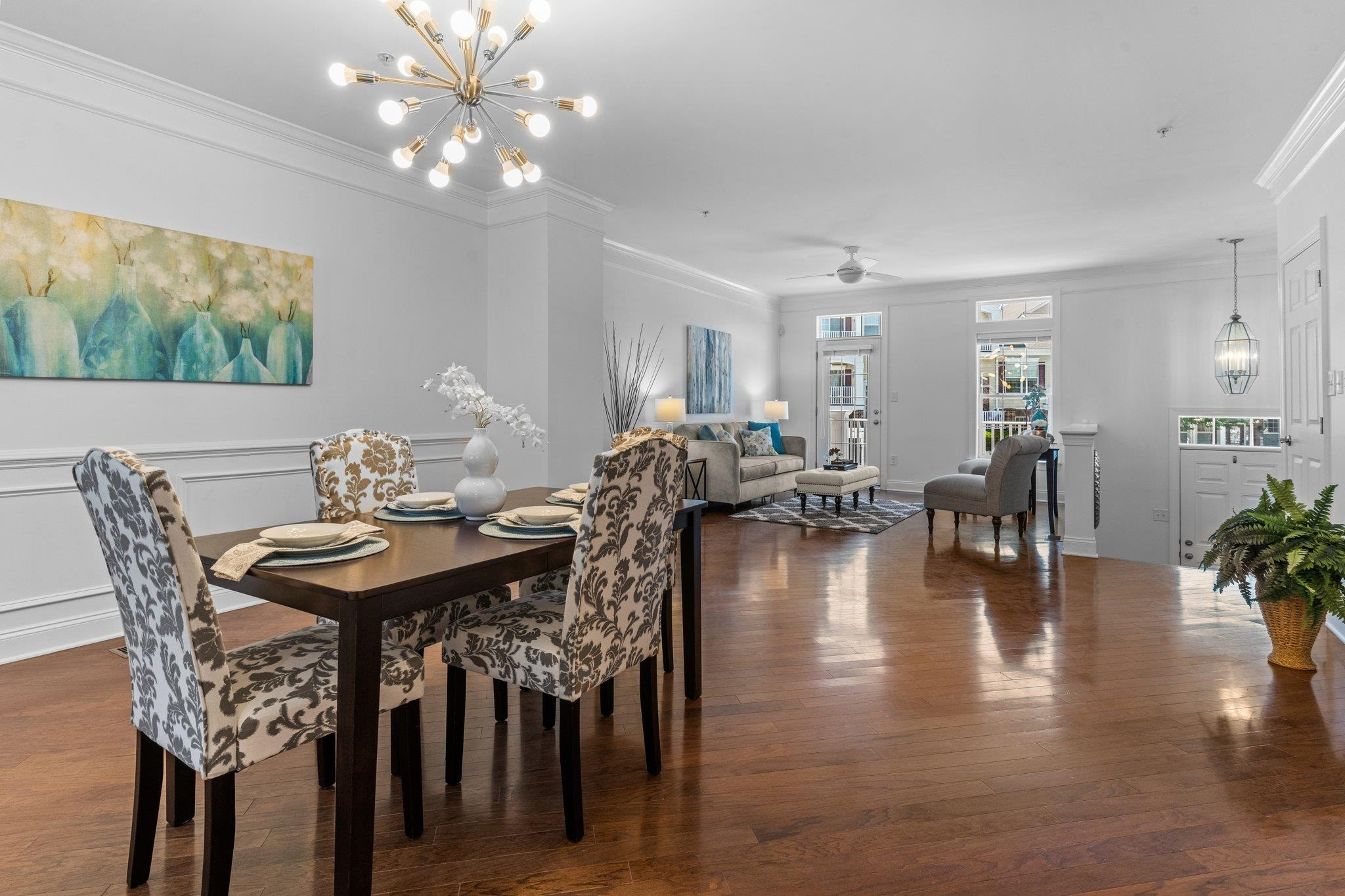10321 Sablewood Drive, Unit 109 Raleigh, NC 27617 - Photo 14 of 47 a view of a dining room with furniture window and wooden floor