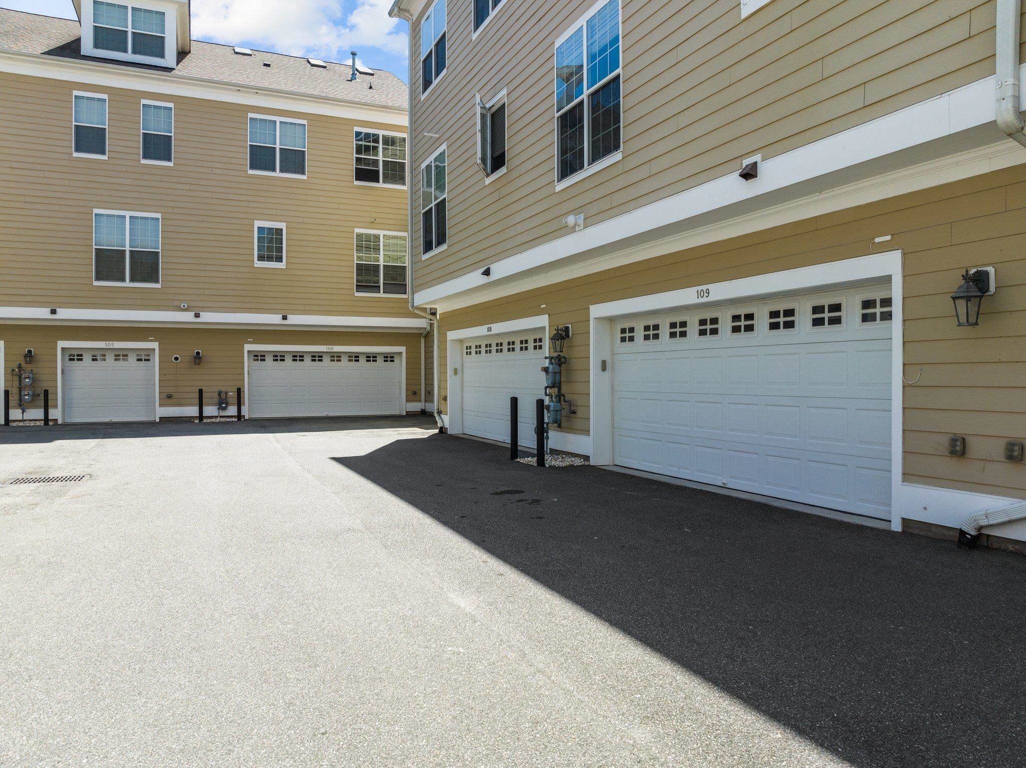 10321 Sablewood Drive, Unit 109 Raleigh, NC 27617 - Photo 33 of 47 a front view of a building with a street