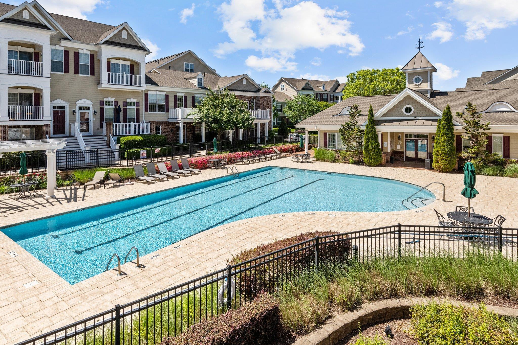 10321 Sablewood Drive, Unit 109 Raleigh, NC 27617 - Photo 36 of 47 a view of multiple houses with a swimming pool