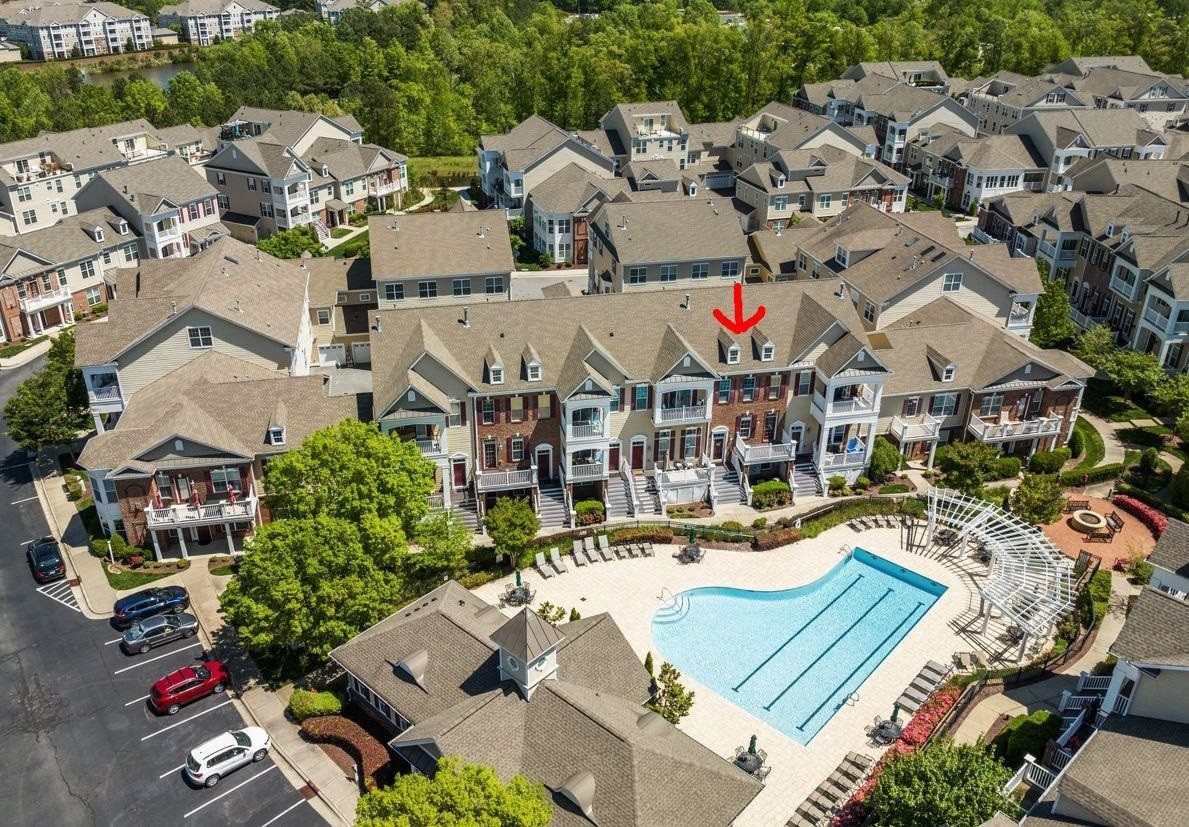 10321 Sablewood Drive, Unit 109 Raleigh, NC 27617 - Photo 40 of 47 an aerial view of residential houses with outdoor space