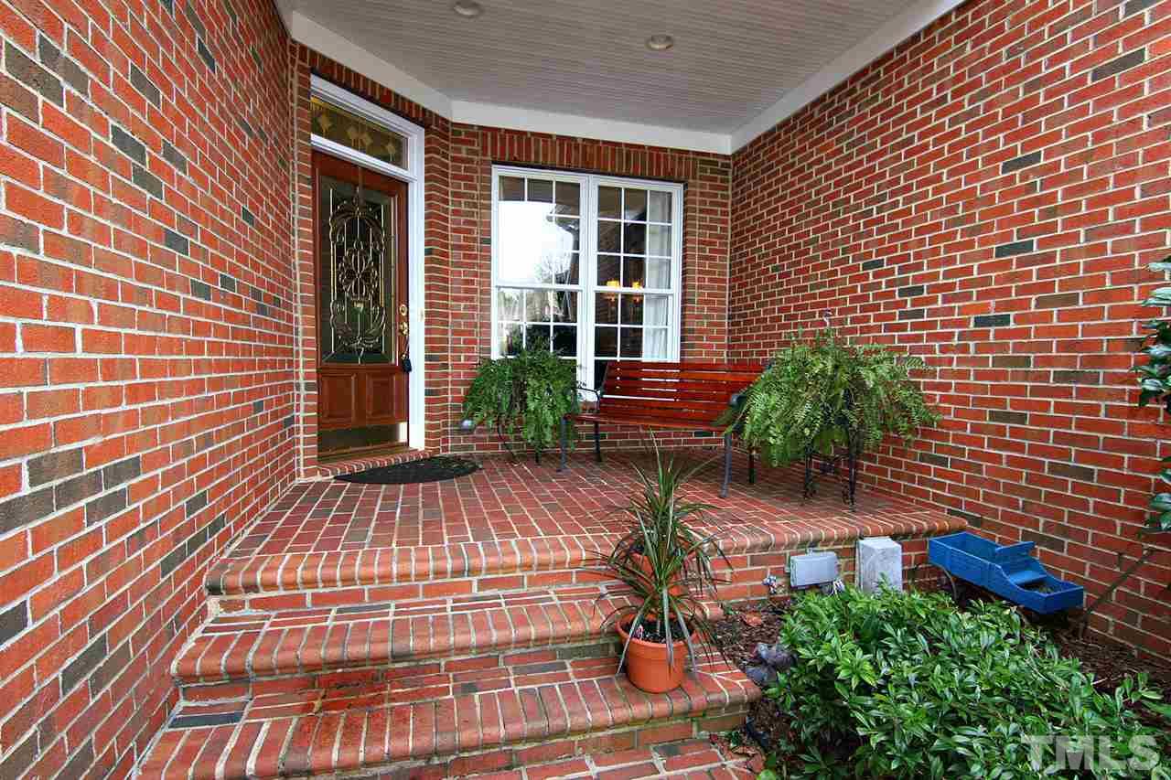 7334 Fontana Ridge Lane Raleigh, NC 27613 - Photo 2 of 24 a view of a backyard with plants