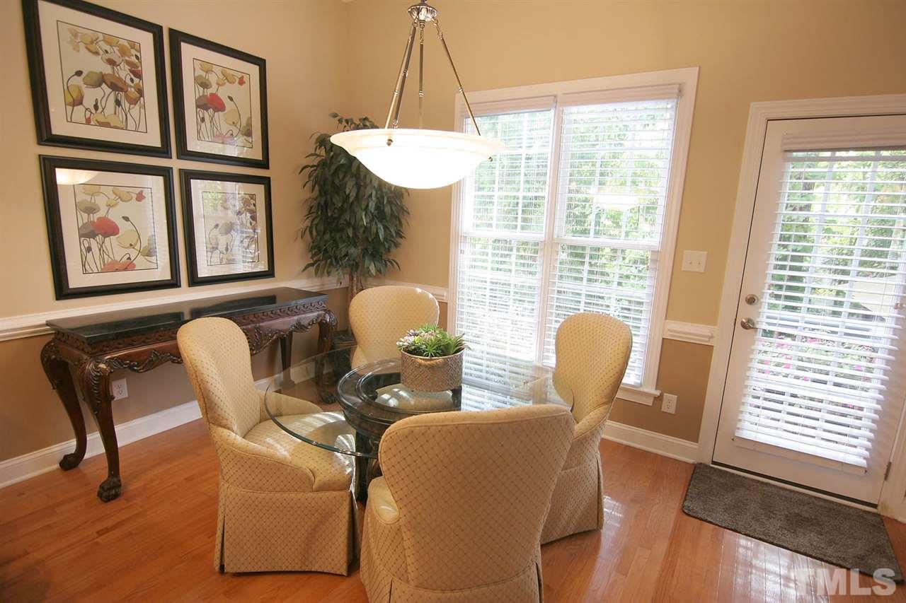 7334 Fontana Ridge Lane Raleigh, NC 27613 - Photo 12 of 24 a dining room with furniture and window
