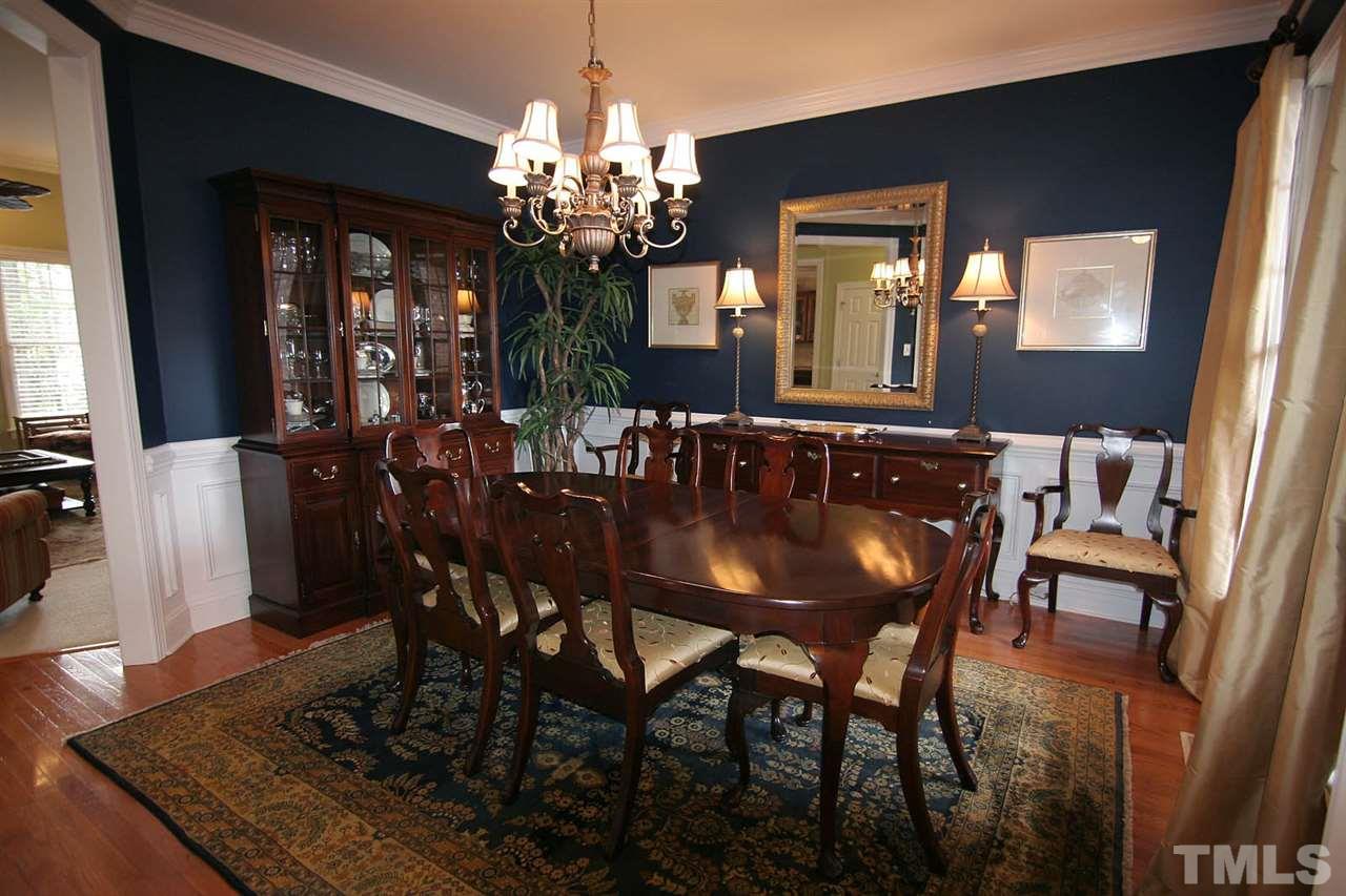 7334 Fontana Ridge Lane Raleigh, NC 27613 - Photo 3 of 24 a view of a dining room with furniture and window