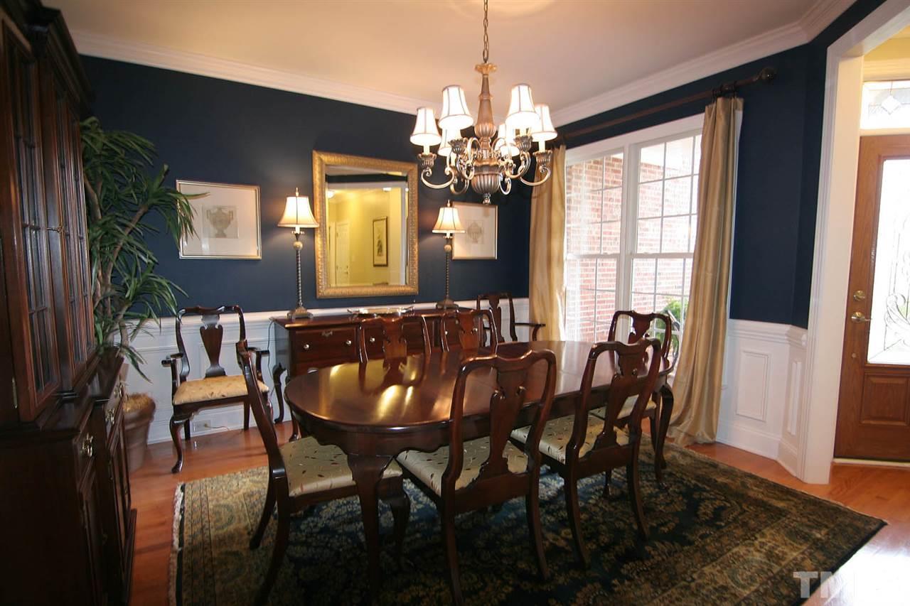 7334 Fontana Ridge Lane Raleigh, NC 27613 - Photo 4 of 24 a view of a dining room with furniture and window
