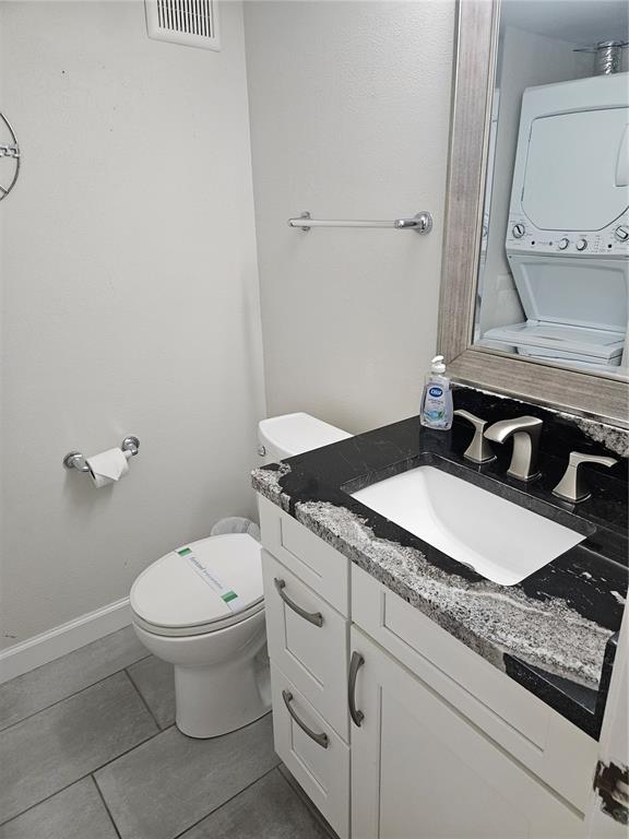 Undisclosed Address Madeira Beach, FL 33708 - Photo 12 of 35 a bathroom with a granite countertop sink and a mirror