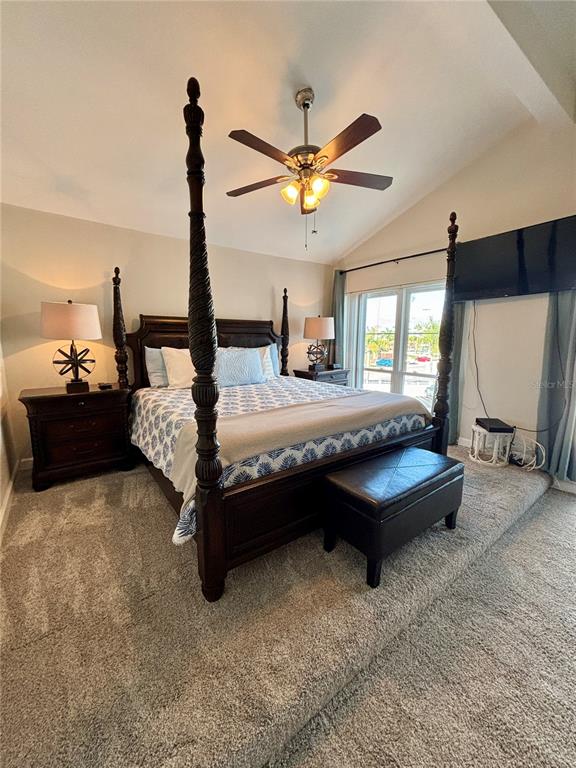 Undisclosed Address Madeira Beach, FL 33708 - Photo 14 of 35 a bedroom with a bed dresser and window