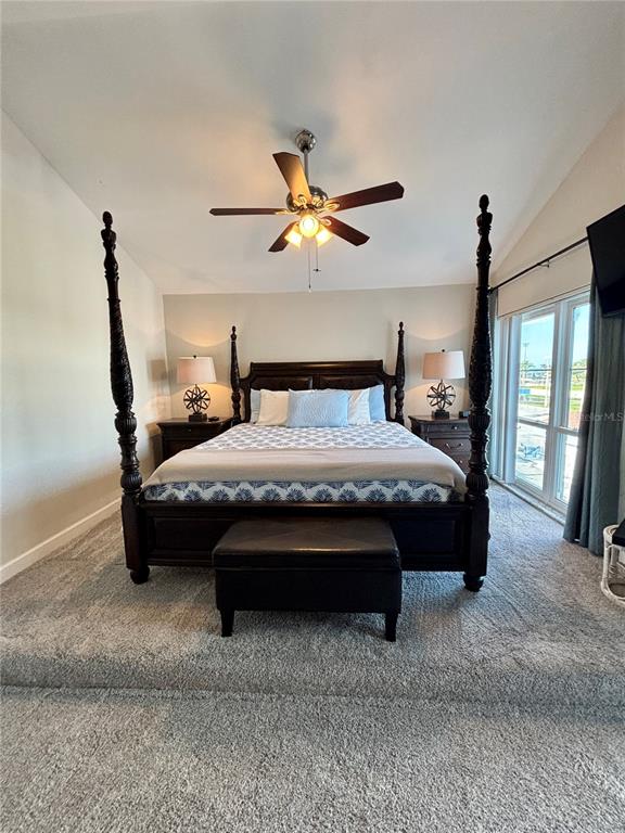 Undisclosed Address Madeira Beach, FL 33708 - Photo 15 of 35 a bedroom with bed and window