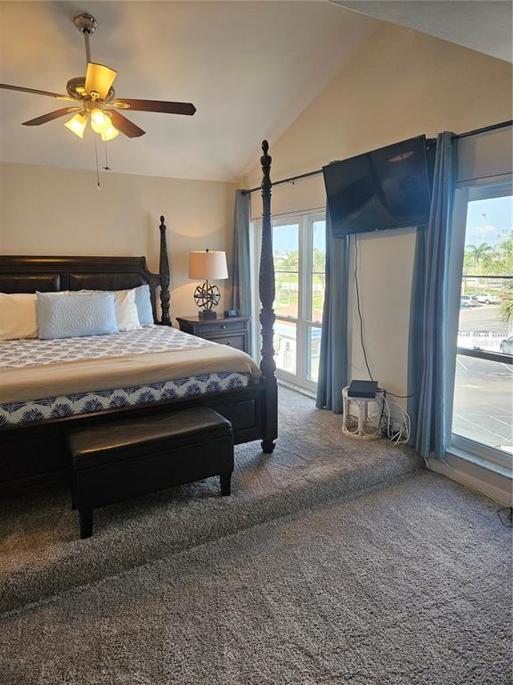 Undisclosed Address Madeira Beach, FL 33708 - Photo 19 of 35 a spacious bedroom with a bed and a window