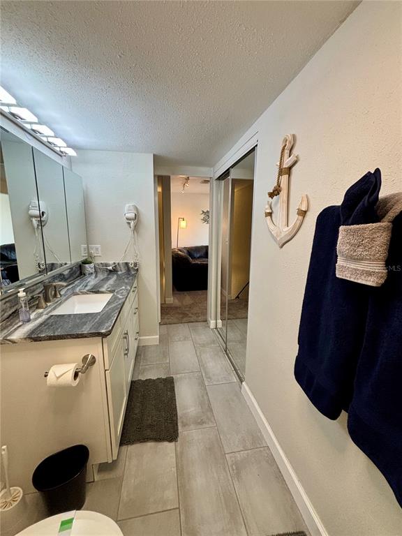 Undisclosed Address Madeira Beach, FL 33708 - Photo 20 of 35 a kitchen with a sink and a refrigerator