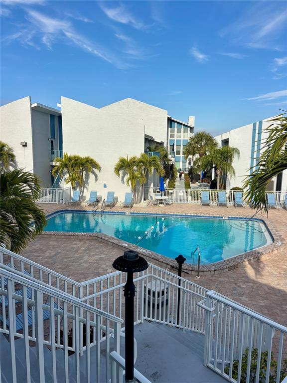 Undisclosed Address Madeira Beach, FL 33708 - Photo 24 of 35 a view of a balcony and yard