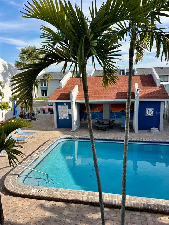 Undisclosed Address Madeira Beach, FL 33708 - Photo 27 of 35 a view of swimming pool with chairs