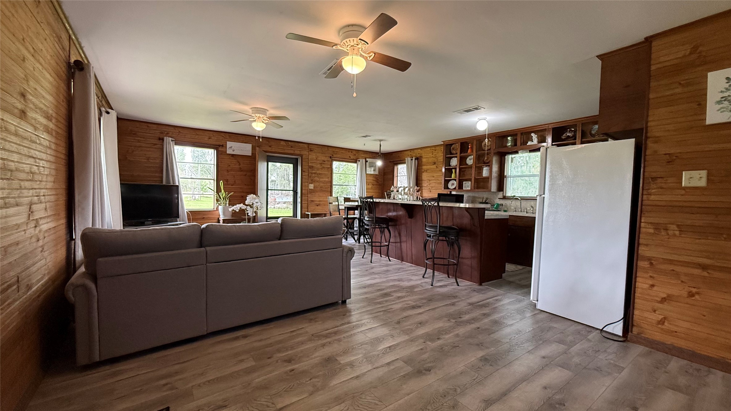 215 Weldon Livingston, TX 77351 - Photo 7 of 22 a living room with furniture and kitchen view