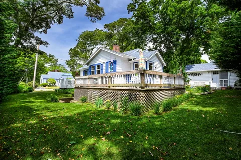 a view of a house with a garden