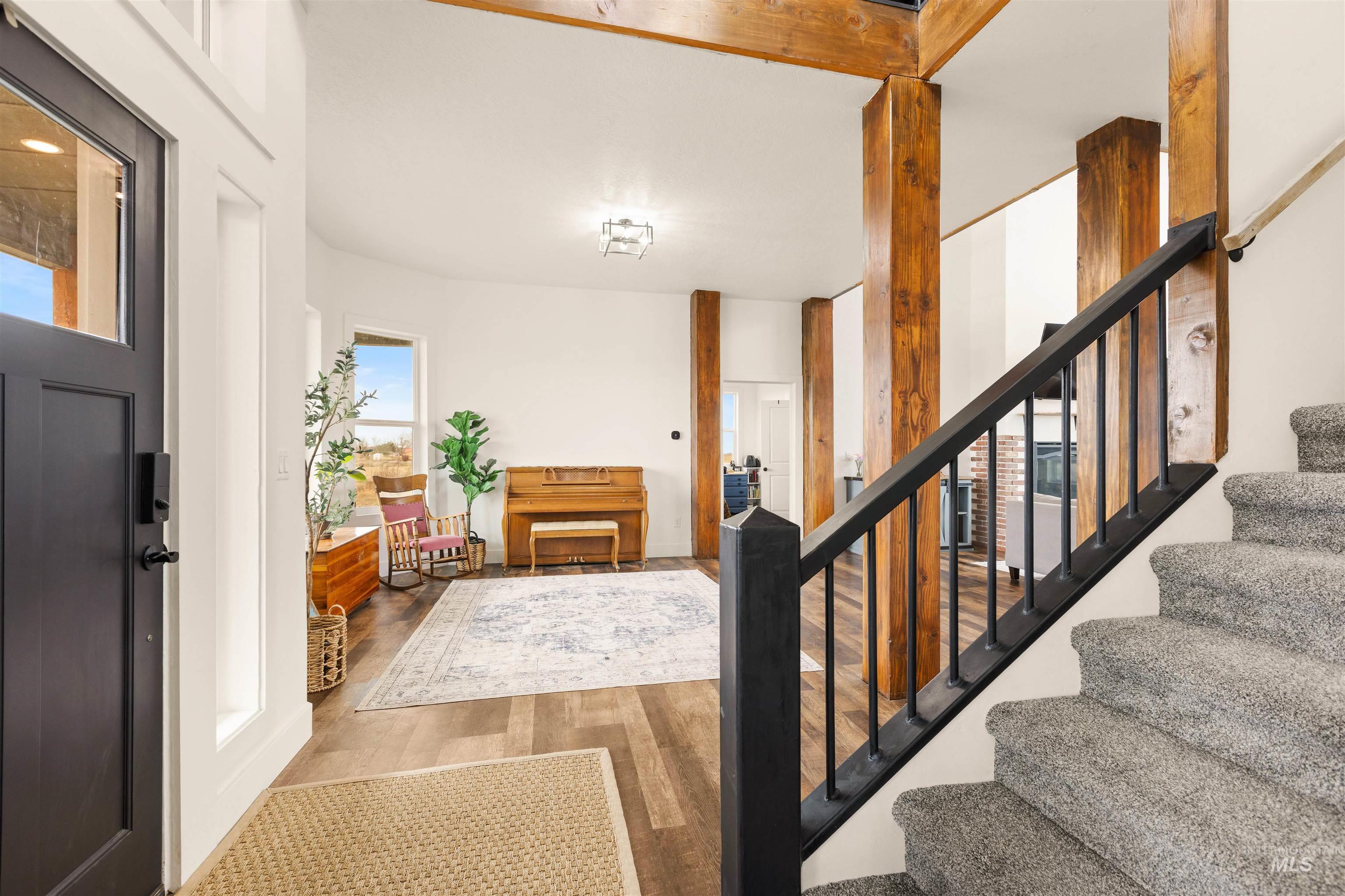 5220 West Central Road Emmett, ID 83617 - Photo 11 of 50 Entrance foyer with stairs and wood finished floors