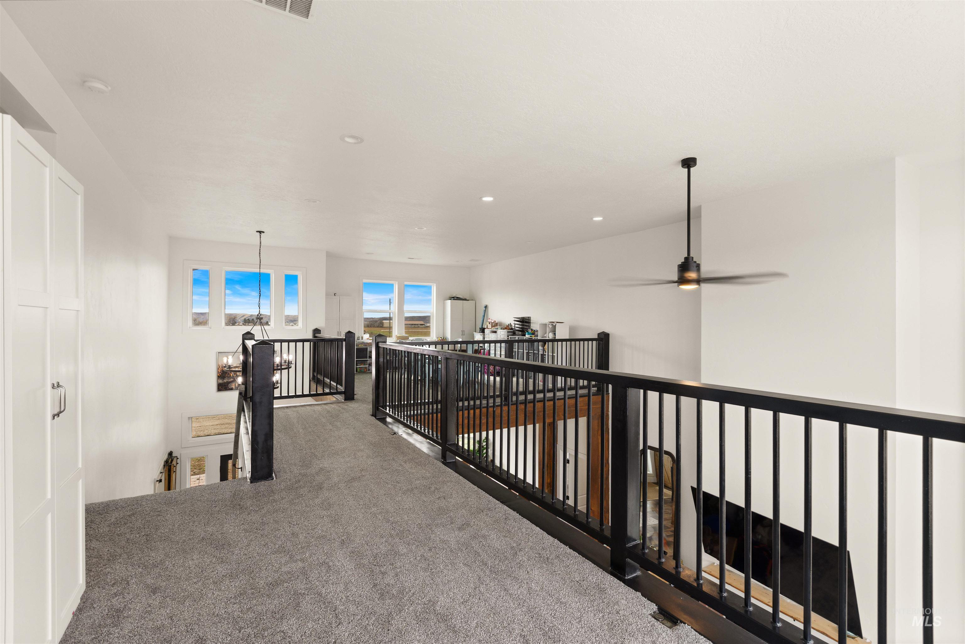 5220 West Central Road Emmett, ID 83617 - Photo 33 of 50 Hall with carpet flooring, an upstairs landing, and recessed lighting