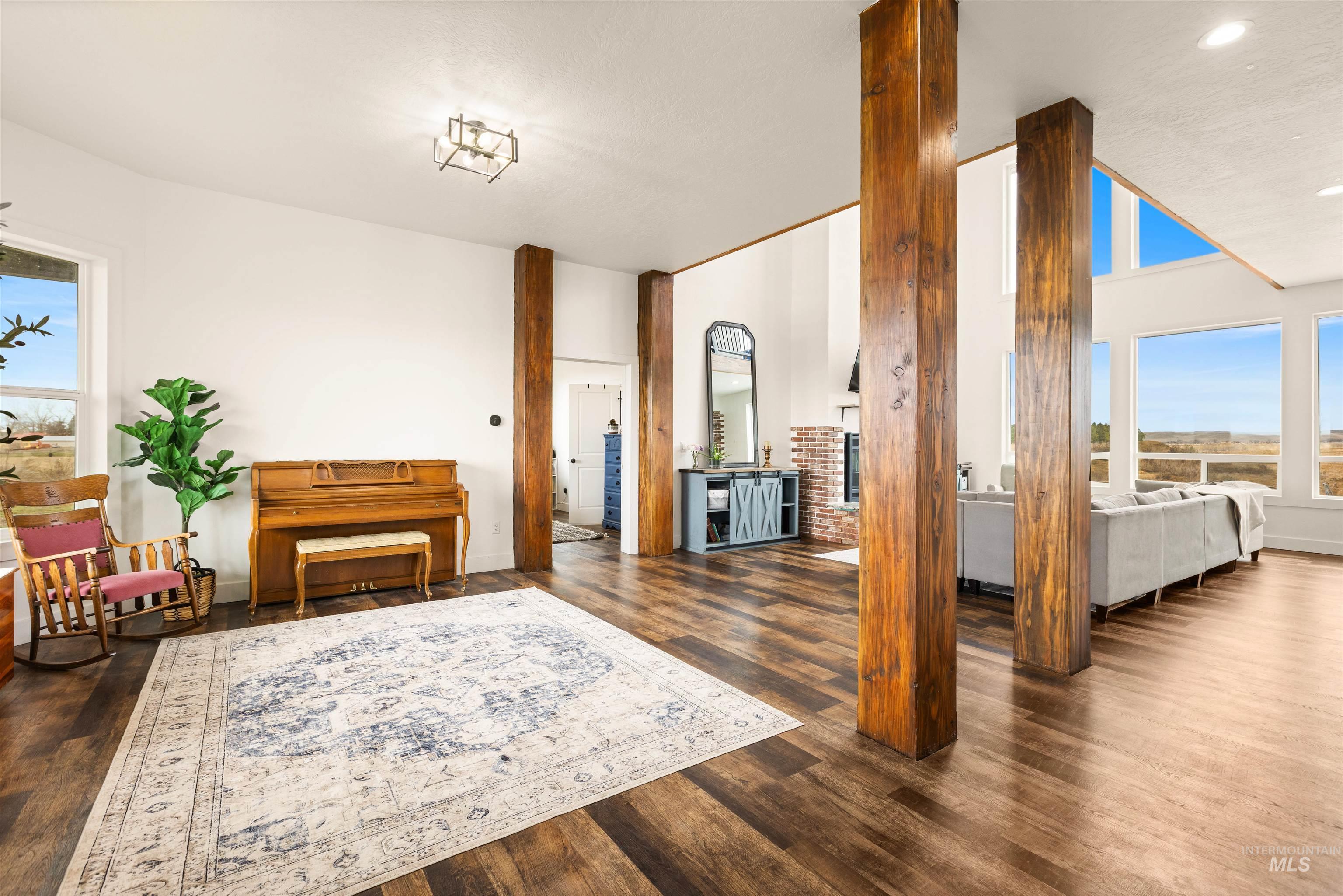 5220 West Central Road Emmett, ID 83617 - Photo 6 of 50 Foyer entrance featuring plenty of natural light, lofted ceiling, dark wood-style floors, and recessed lighting