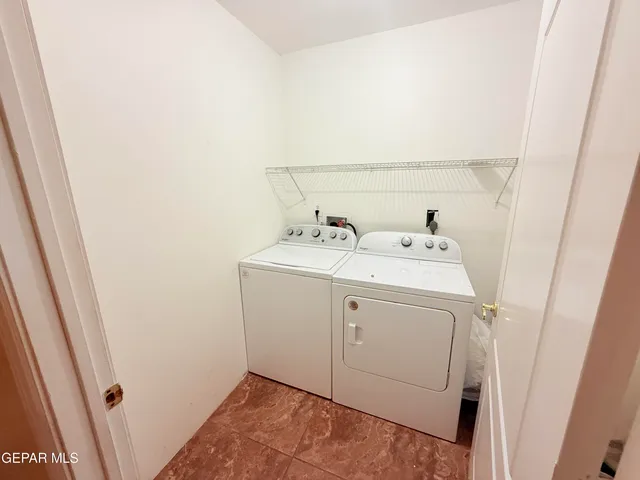 a bathroom with a tub sink and a mirror