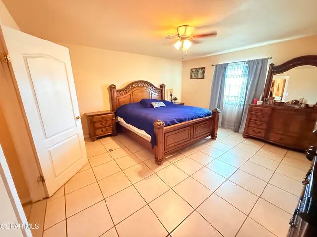 a view of a two chairs in the patio