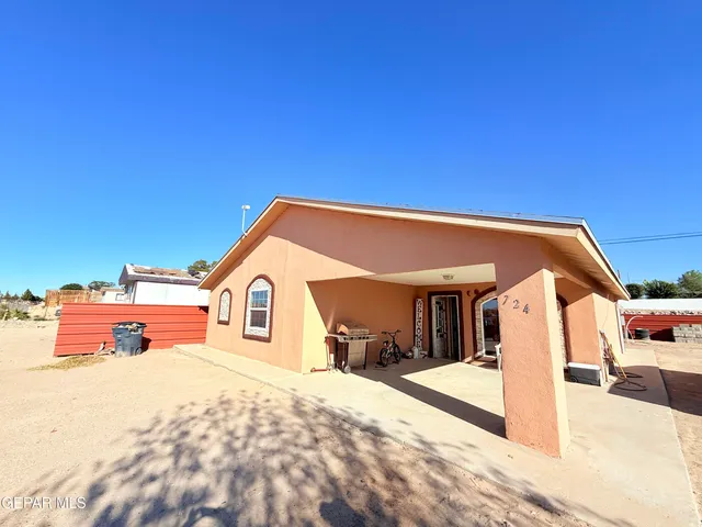 a view of a house with a patio
