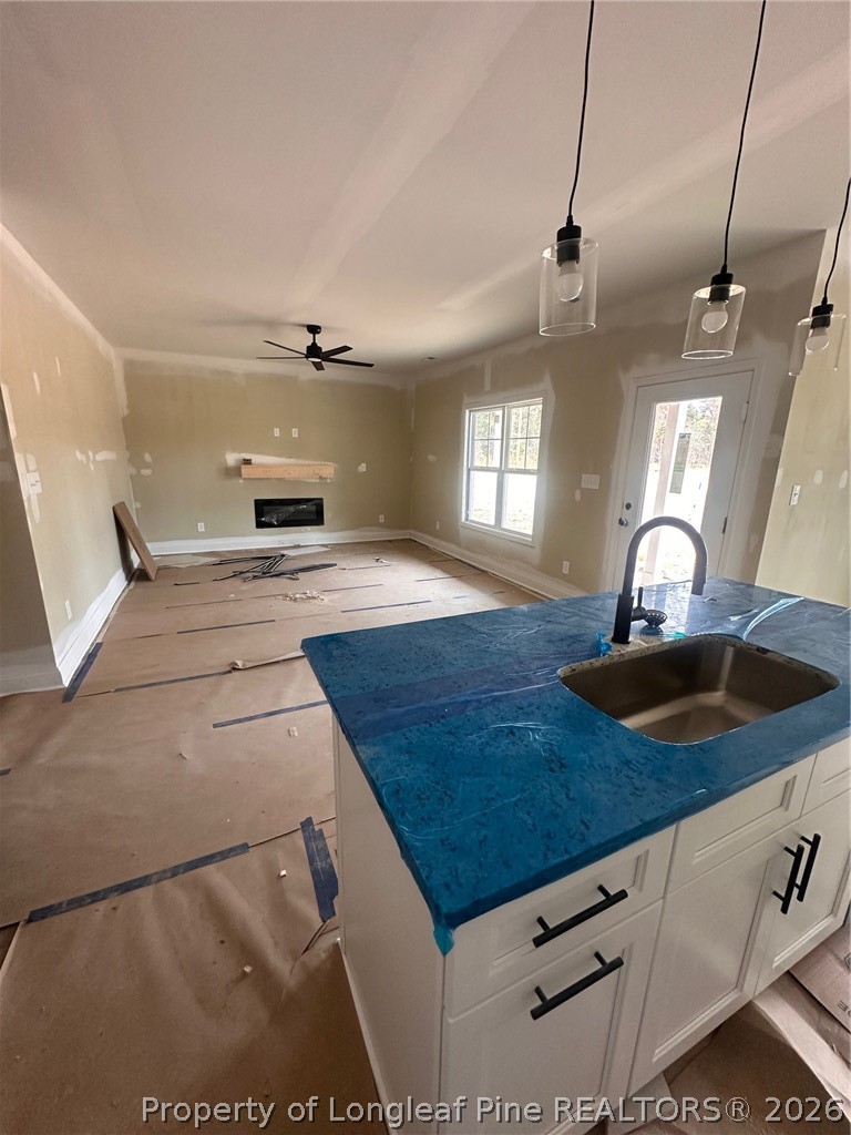 121 Merle Road Pinebluff, NC 28373 - Photo 5 of 28 a view of living room with granite countertop furniture and fireplace