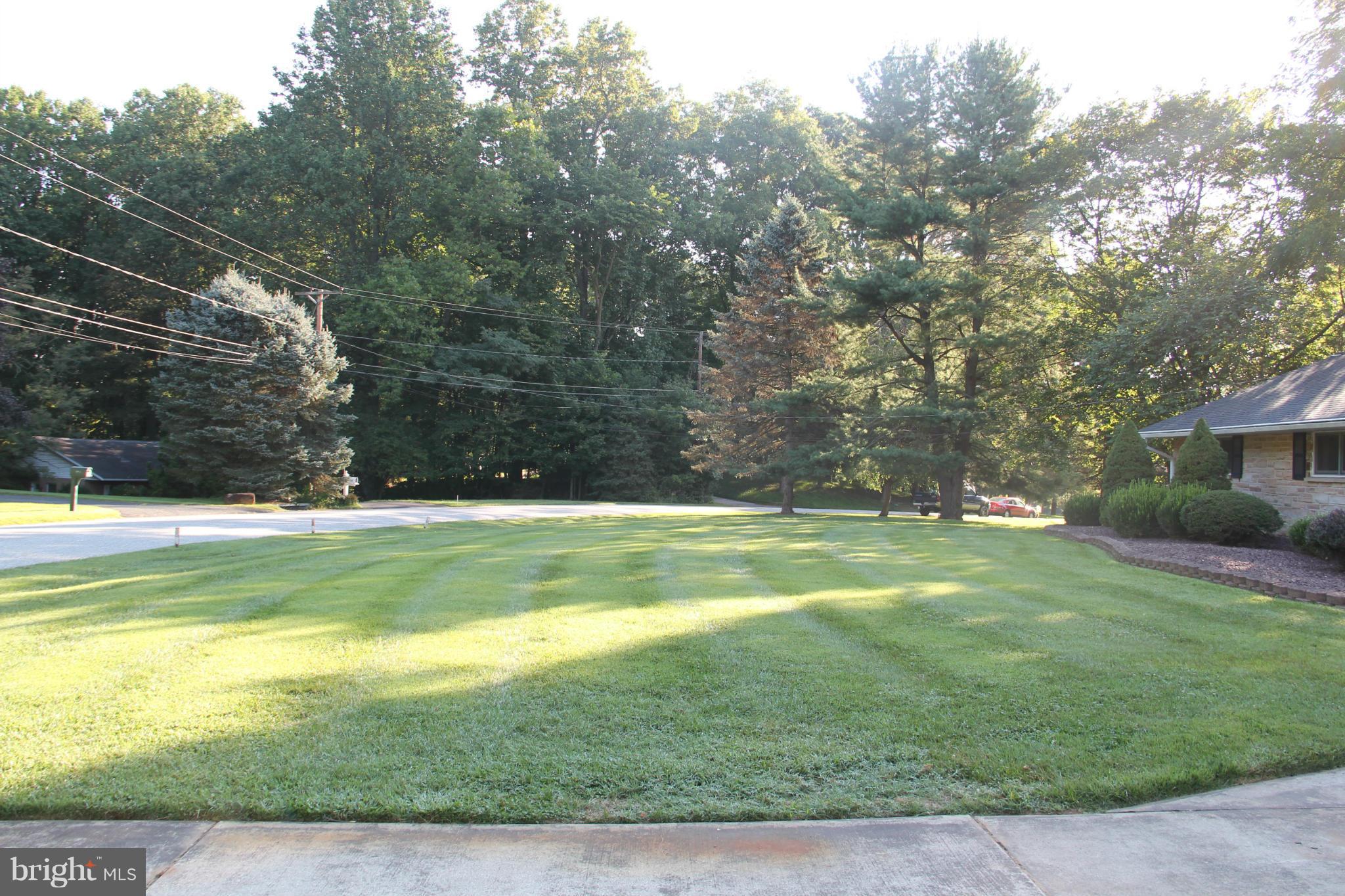9913 Fox Hill Road Perry Hall, MD 21128 - Photo 4 of 24 a view of swimming pool with a yard