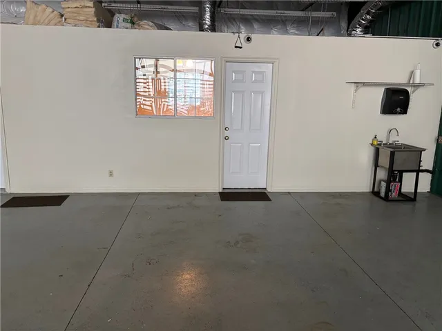 a view of kitchen with natural light