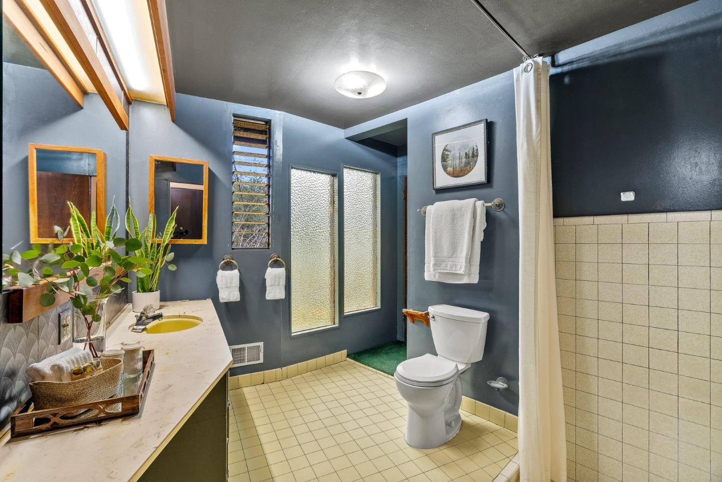 231 Aptos School Road Aptos, CA 95003 - Photo 23 of 49 a spacious bathroom with a toilet a sink and shower