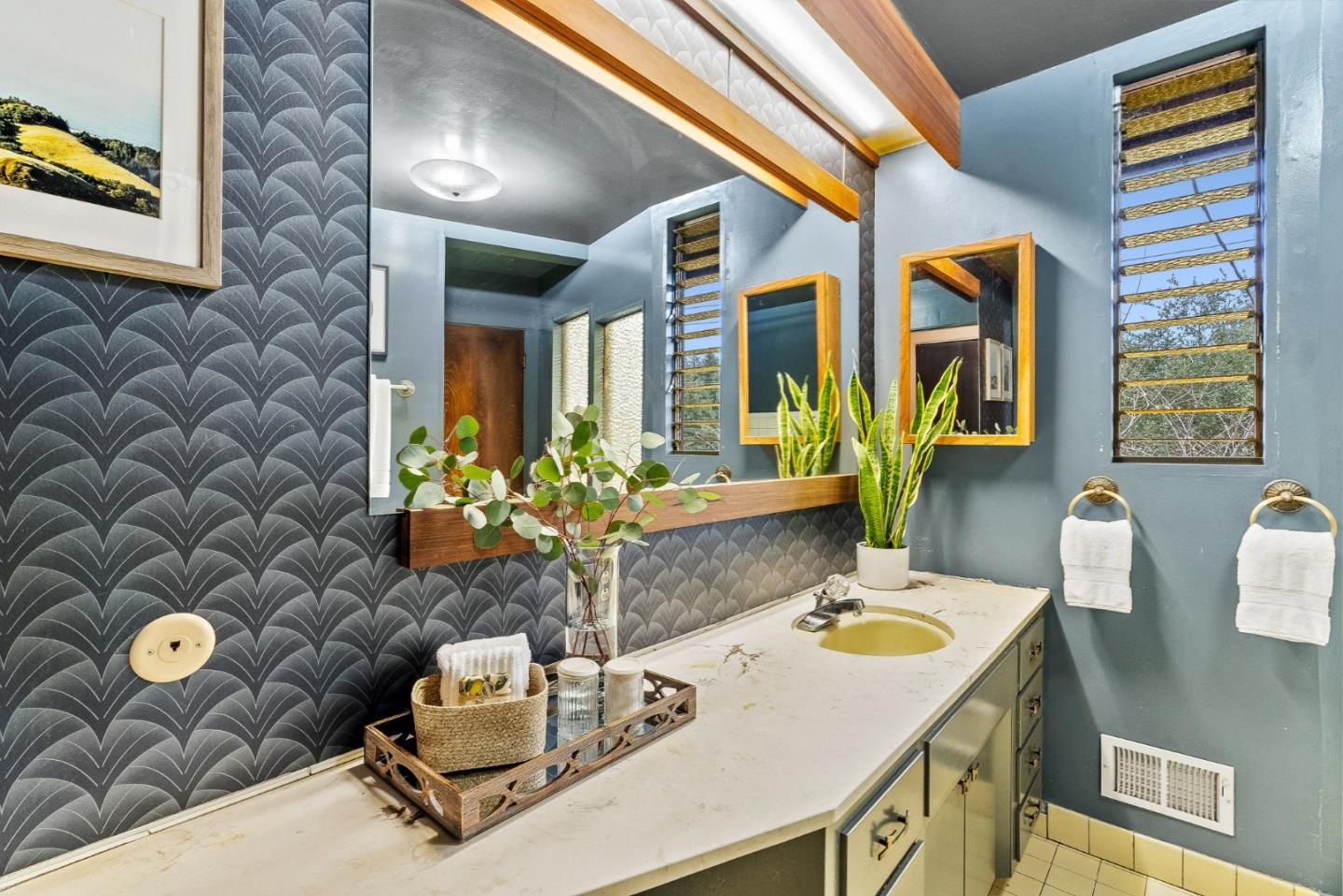 231 Aptos School Road Aptos, CA 95003 - Photo 24 of 49 a bathroom with a sink and a mirror