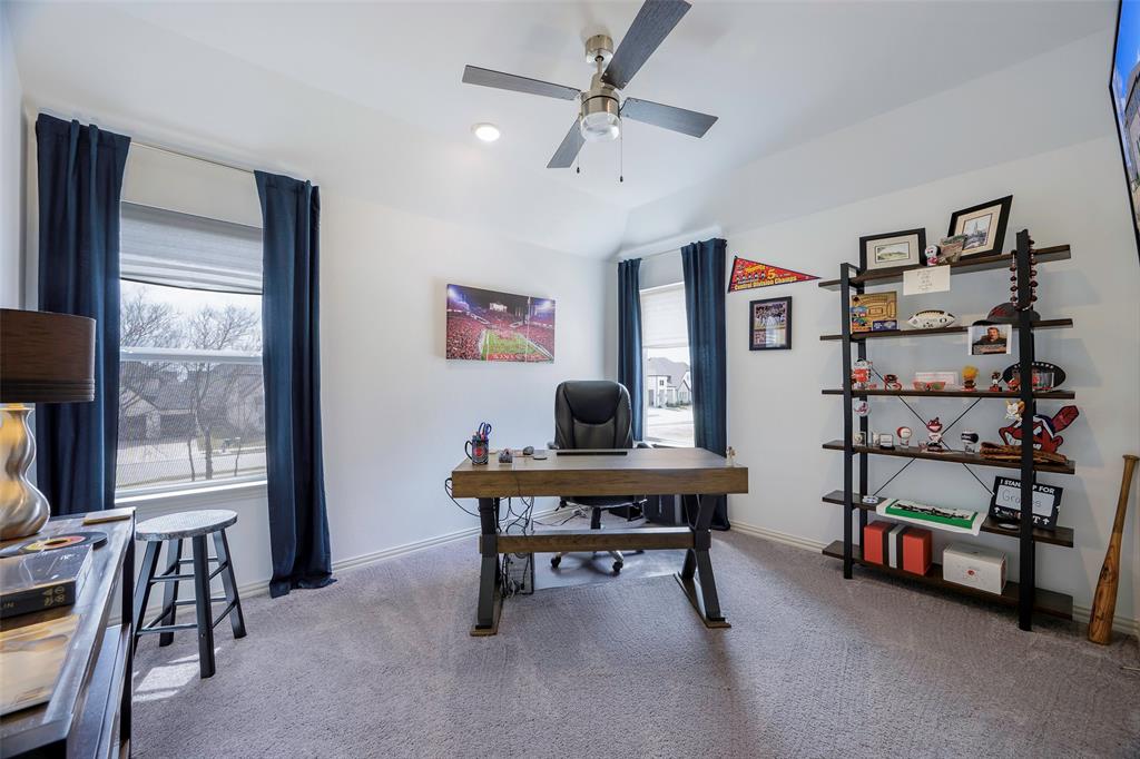1311 Union Road Celina, TX 75009 - Photo 24 of 38 a living room with furniture a ceiling fan and a window
