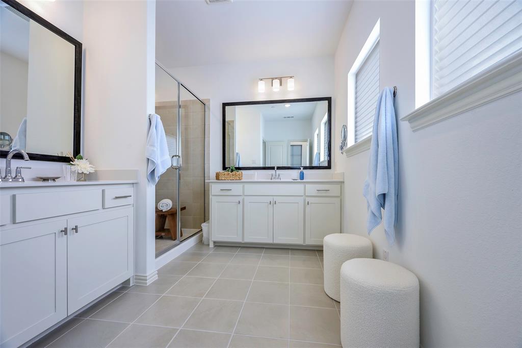 1311 Union Road Celina, TX 75009 - Photo 29 of 38 a bathroom with a sink toilet and mirror