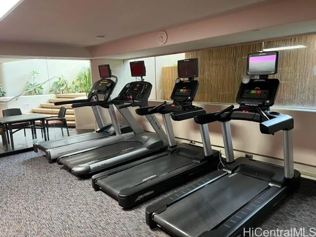 a view of a room with gym equipment