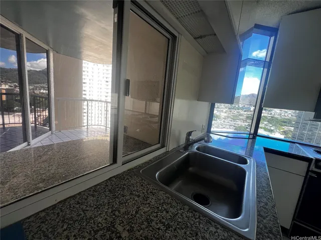 a room with furniture and a mirror