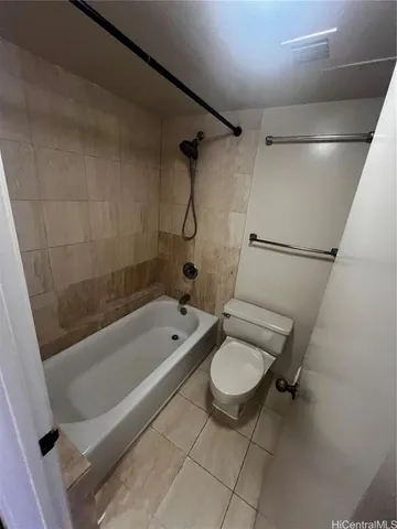 a bathroom with a sink a toilet and a bathtub
