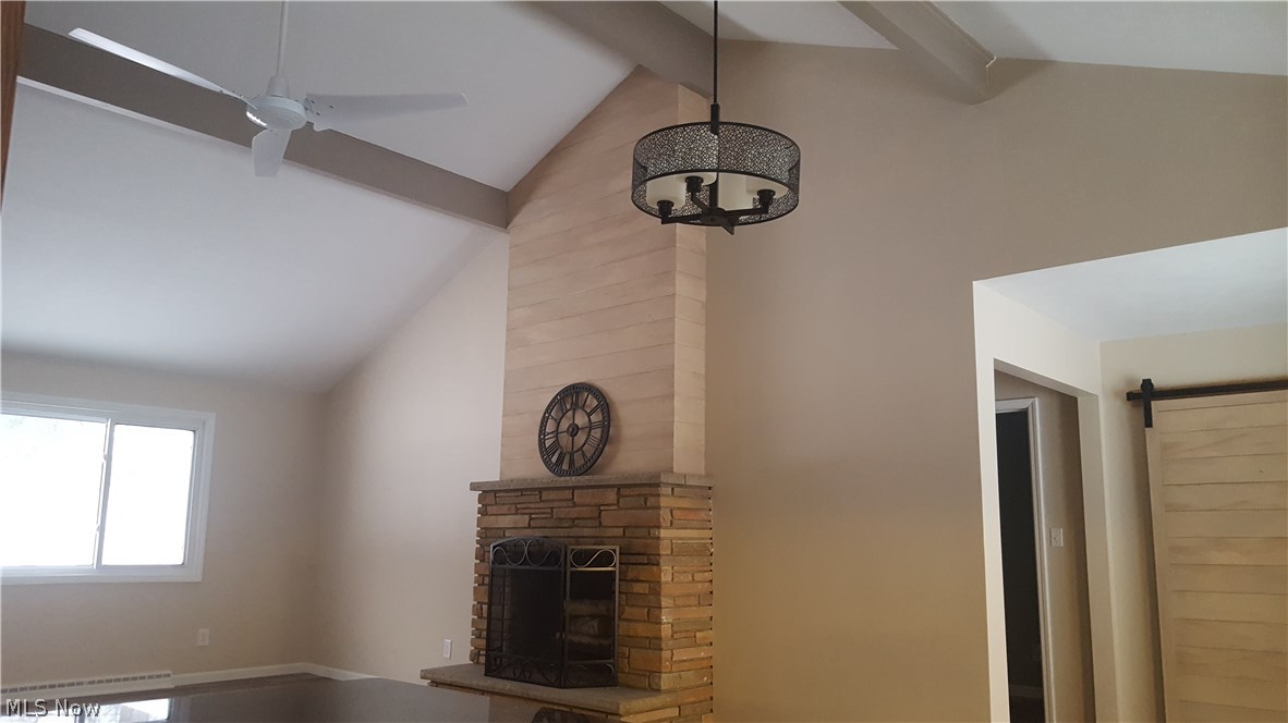 8317 Chagrin Road Chagrin Falls, OH 44023 - Photo 4 of 20 The incredible fireplace and vaulted main living area, view from kitchen