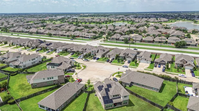 an aerial view of a house with a garden