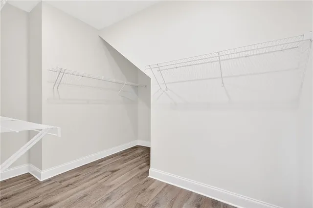 a view of an empty walk in closet