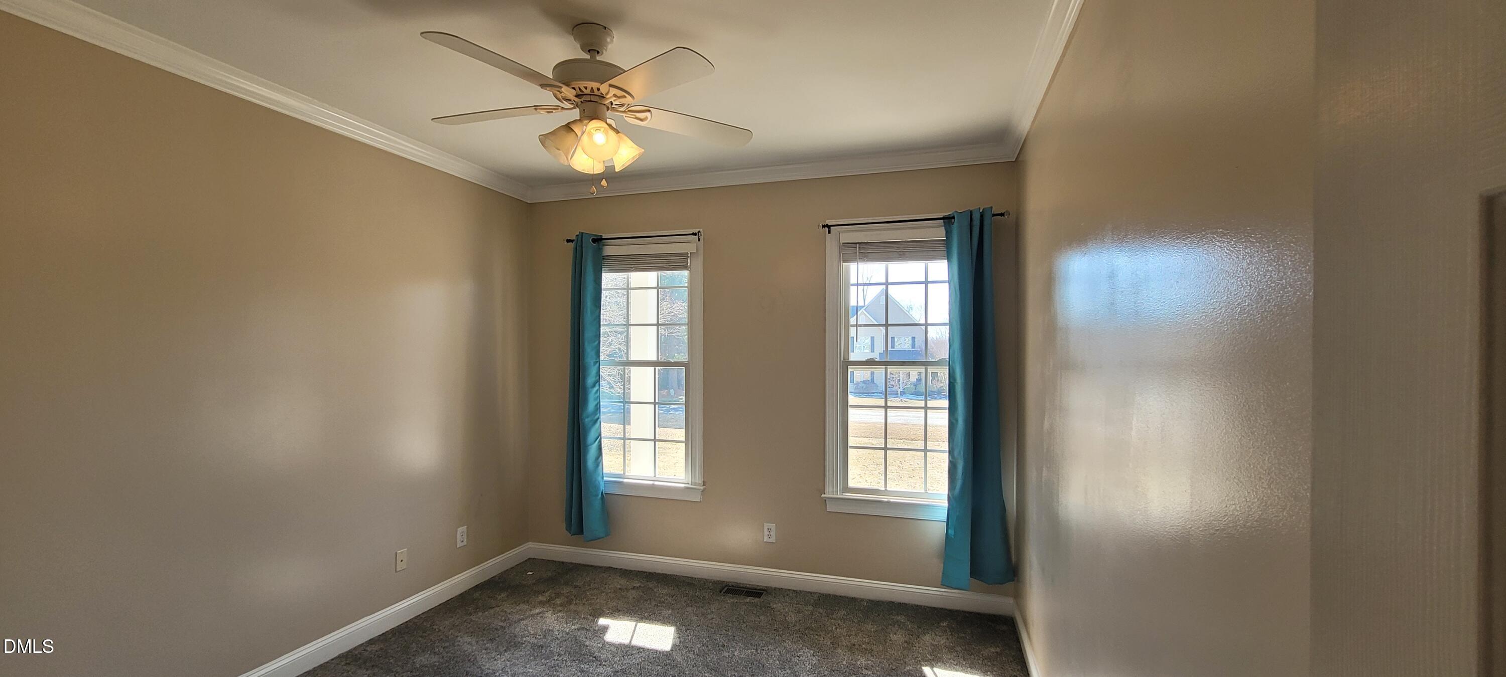 226 Fletcher Ridge Road Timberlake, NC 27583 - Photo 19 of 30 wooden floor in an empty room with a window
