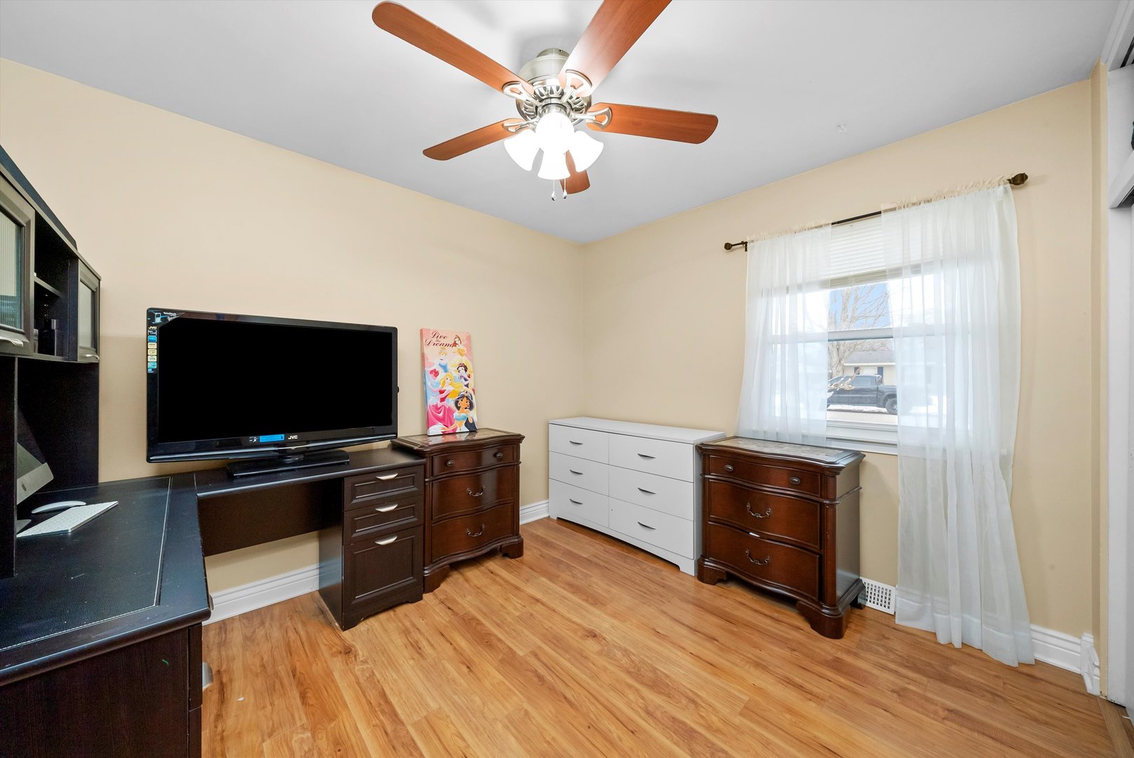 11 Greenfield Road Montgomery, IL 60538 - Photo 13 of 22 a bedroom with a bed and a flat screen tv