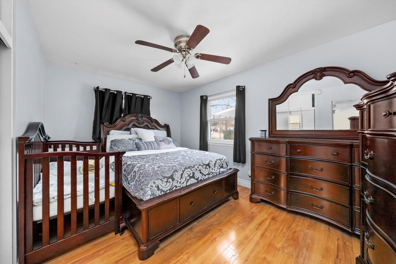 11 Greenfield Road Montgomery, IL 60538 - Photo 14 of 22 a bed room with a bed and a window