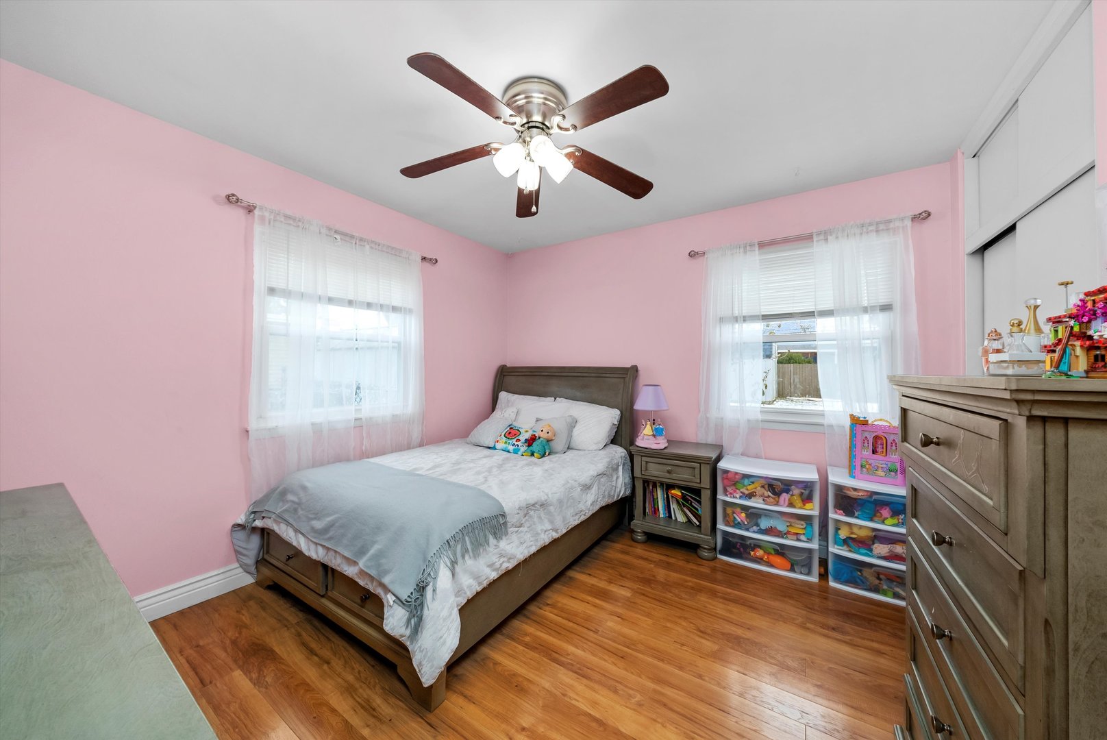 11 Greenfield Road Montgomery, IL 60538 - Photo 15 of 22 a bedroom with a bed and a ceiling fan