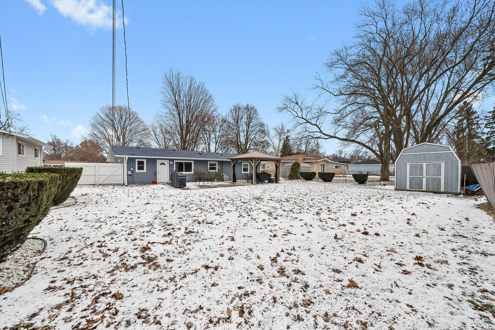11 Greenfield Road Montgomery, IL 60538 - Photo 20 of 22 a front view of house with a yard covered with snow
