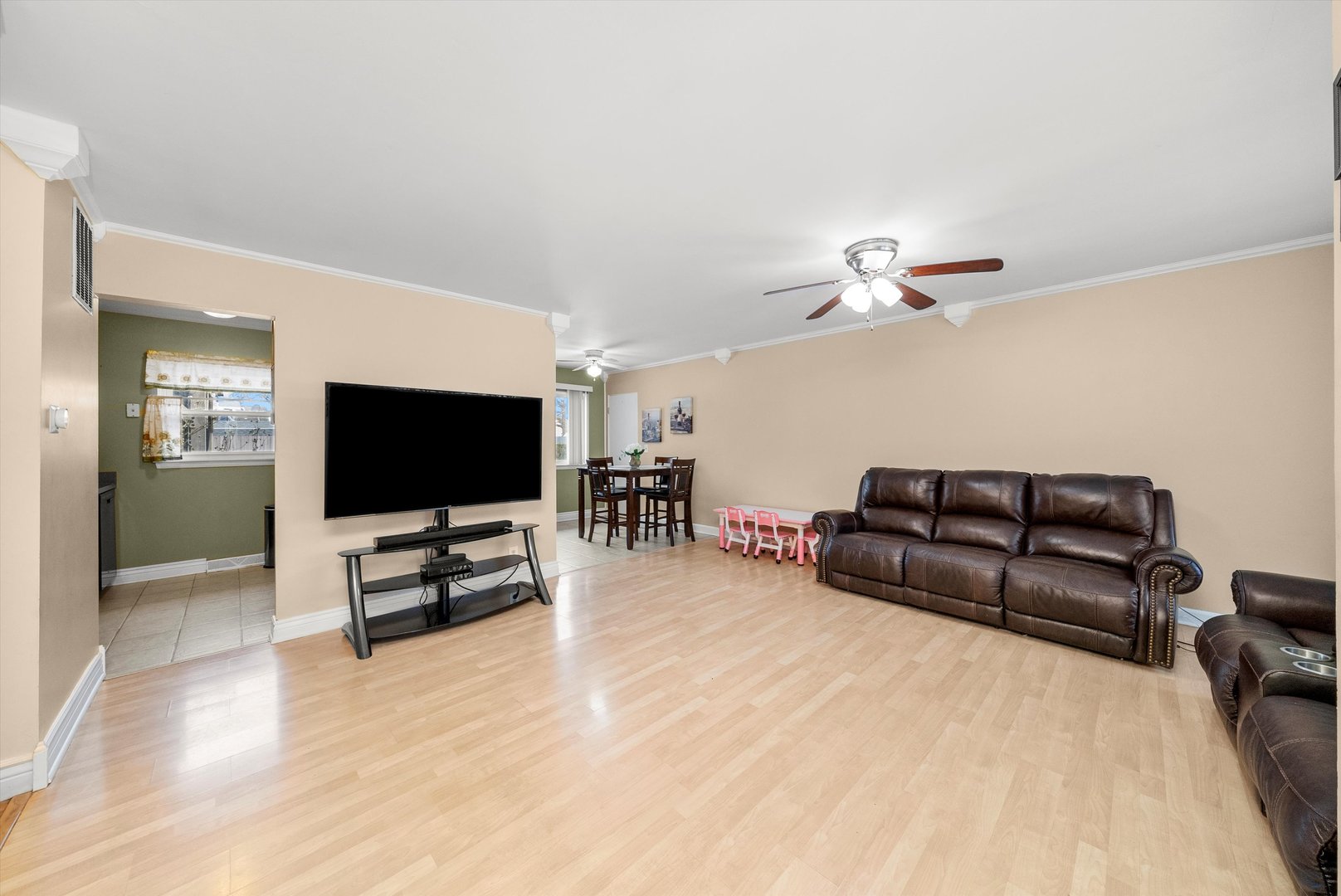 11 Greenfield Road Montgomery, IL 60538 - Photo 3 of 22 a living room with furniture and a flat screen tv