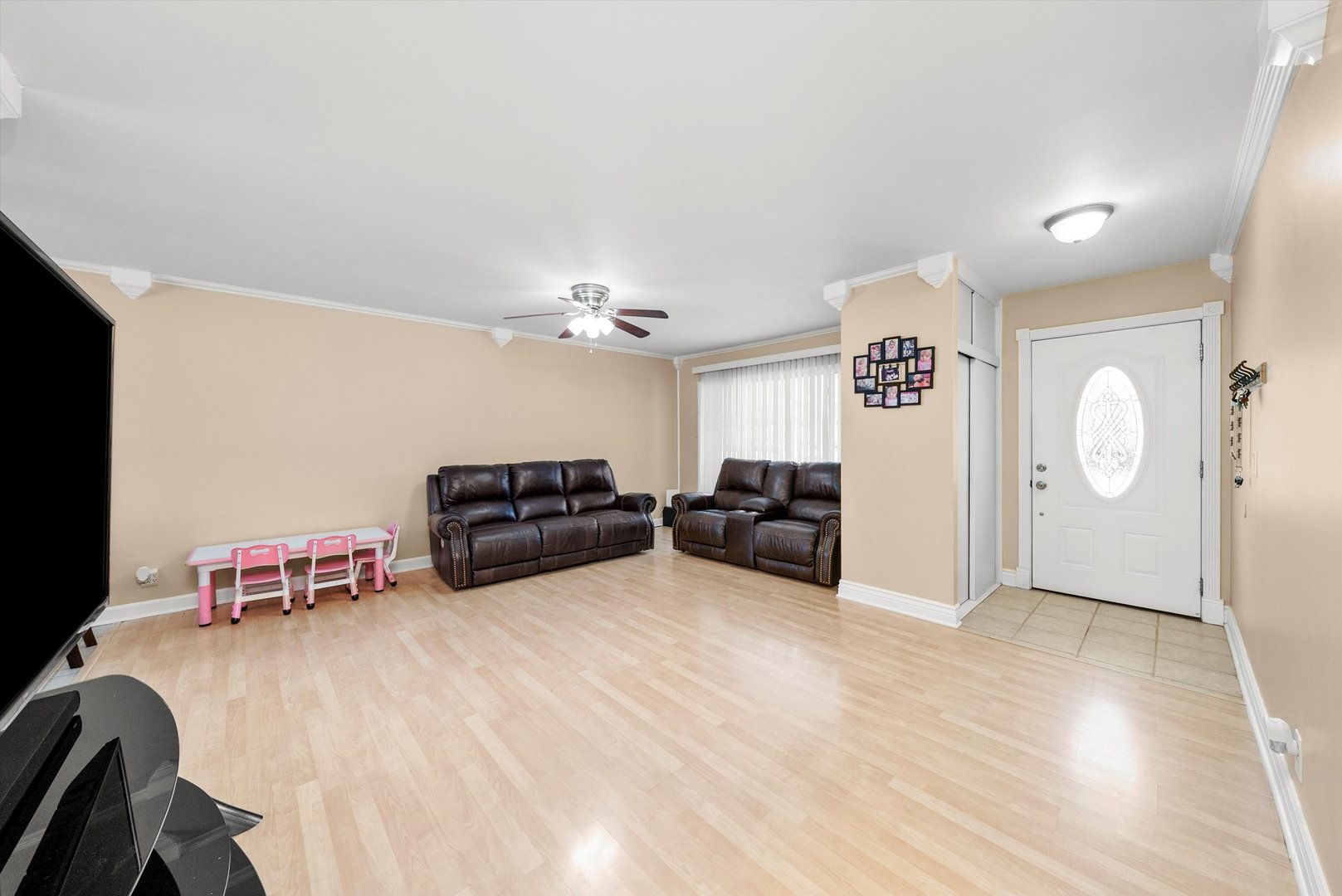 11 Greenfield Road Montgomery, IL 60538 - Photo 4 of 22 a living room with furniture and a flat screen tv