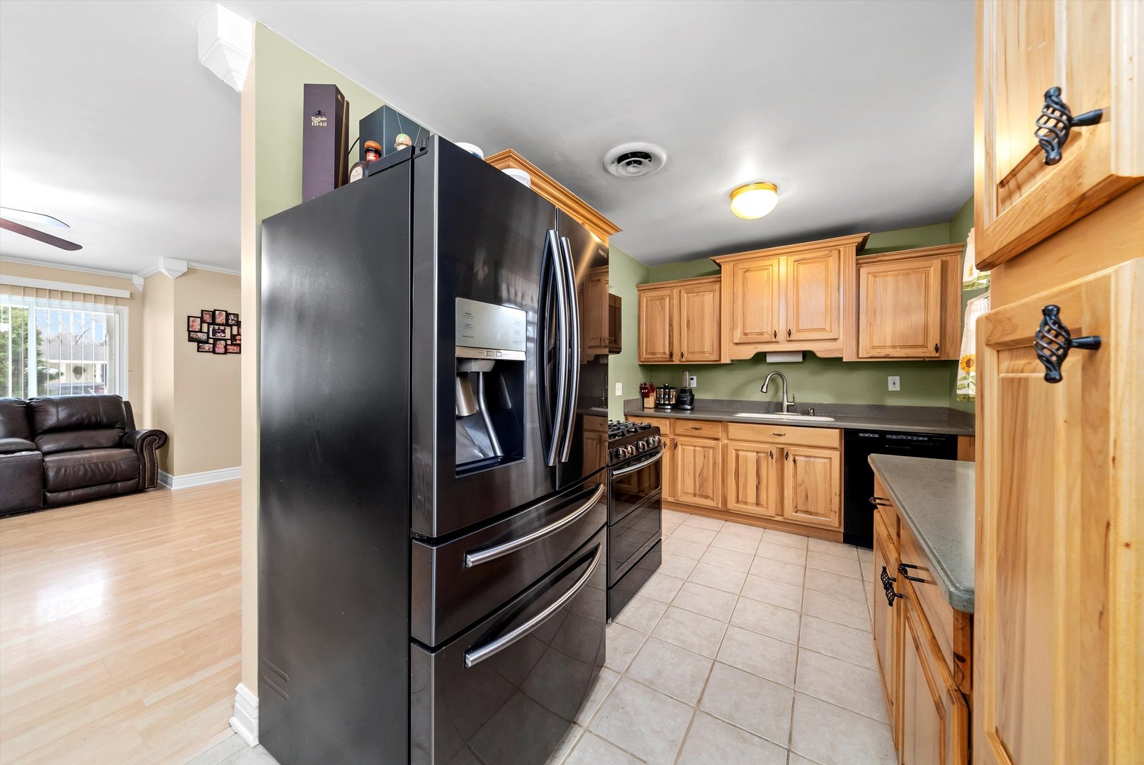 11 Greenfield Road Montgomery, IL 60538 - Photo 8 of 22 a kitchen with a refrigerator and a sink